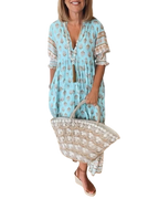 Thea – Robe fleurie chic à col en V