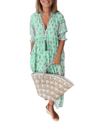 Thea – Robe fleurie chic à col en V