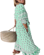 Thea – Robe fleurie chic à col en V