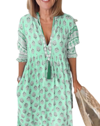 Thea – Robe fleurie chic à col en V