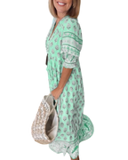 Thea – Robe fleurie chic à col en V