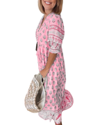 Thea – Robe fleurie chic à col en V