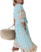 Thea – Robe fleurie chic à col en V