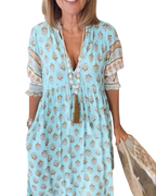 Thea – Robe fleurie chic à col en V